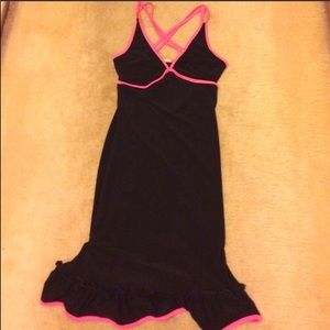 Cute black and pink ruffle dress.
Size medium
